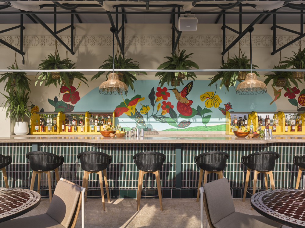 Calypso inspired rooftop pool and Bahamian rum bar paying homage to the rich Caribbean heritage of Coconut Grove.