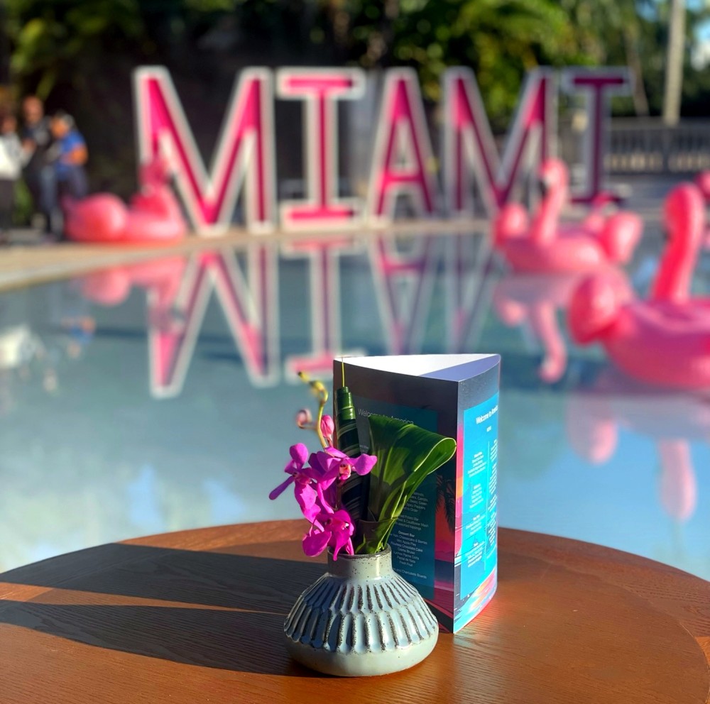"Flamingle" themed Welcome to MIAMI Reception at Pool
