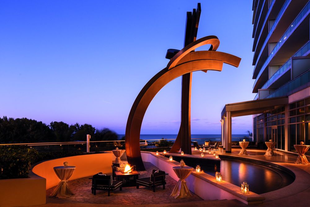 The Guy Dill Terrace, punctuated by its striking sculpture, affords views of the Atlantic Ocean and Haulover Cut and is ideal for receptions or ceremonies.