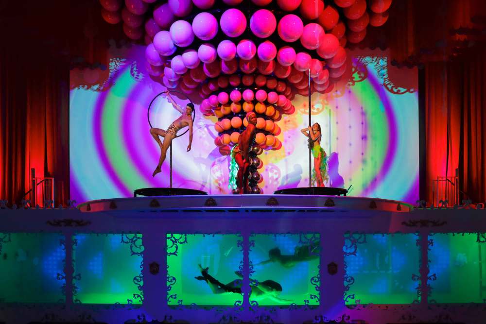 The centerpiece of Super Funland, a 40 foot mermaid tank with live performances.