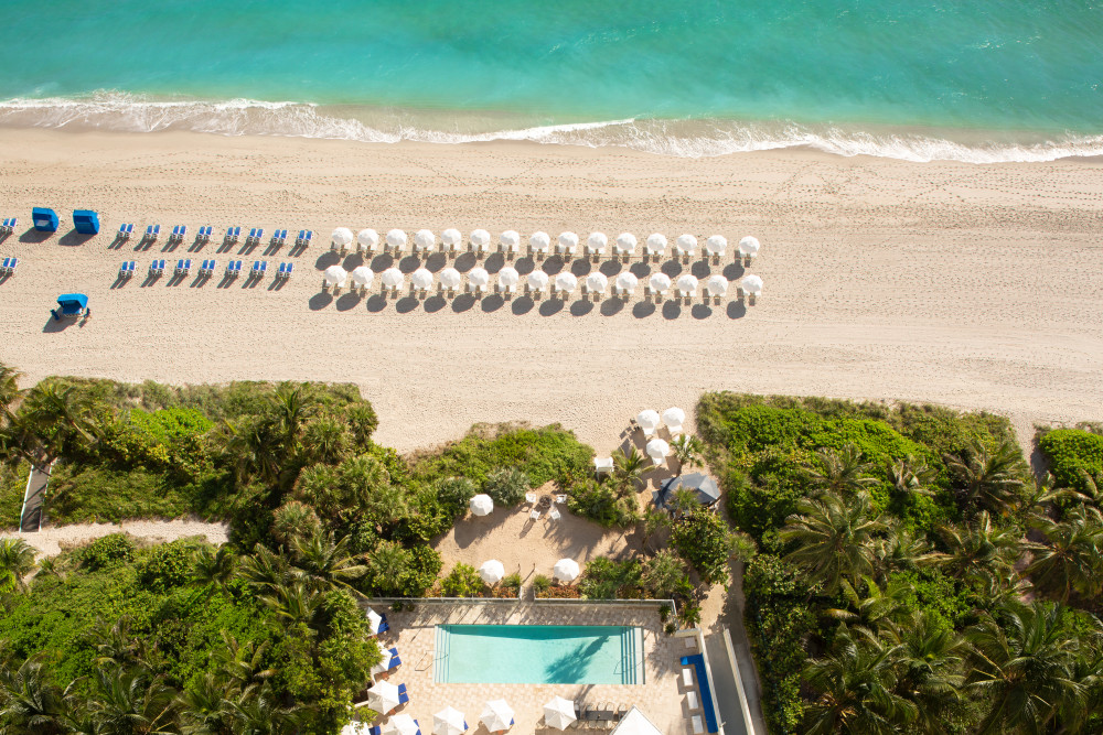Enjoy private beach access with beach chairs, towels and umbrella service.