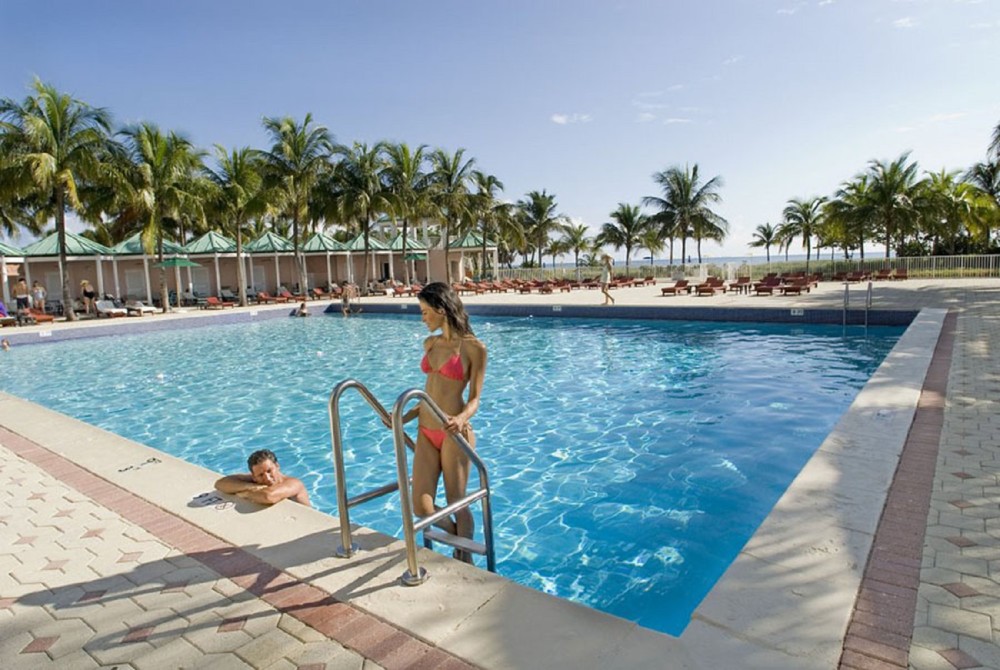 Olympic size heated swimming pool surrounded by Key West style cabanas.  Food & Beverage, bar and pool services provided.  Accommodates up to 6 persons with chairs and loungers, private shower, bathroom, refrigerator and microwave