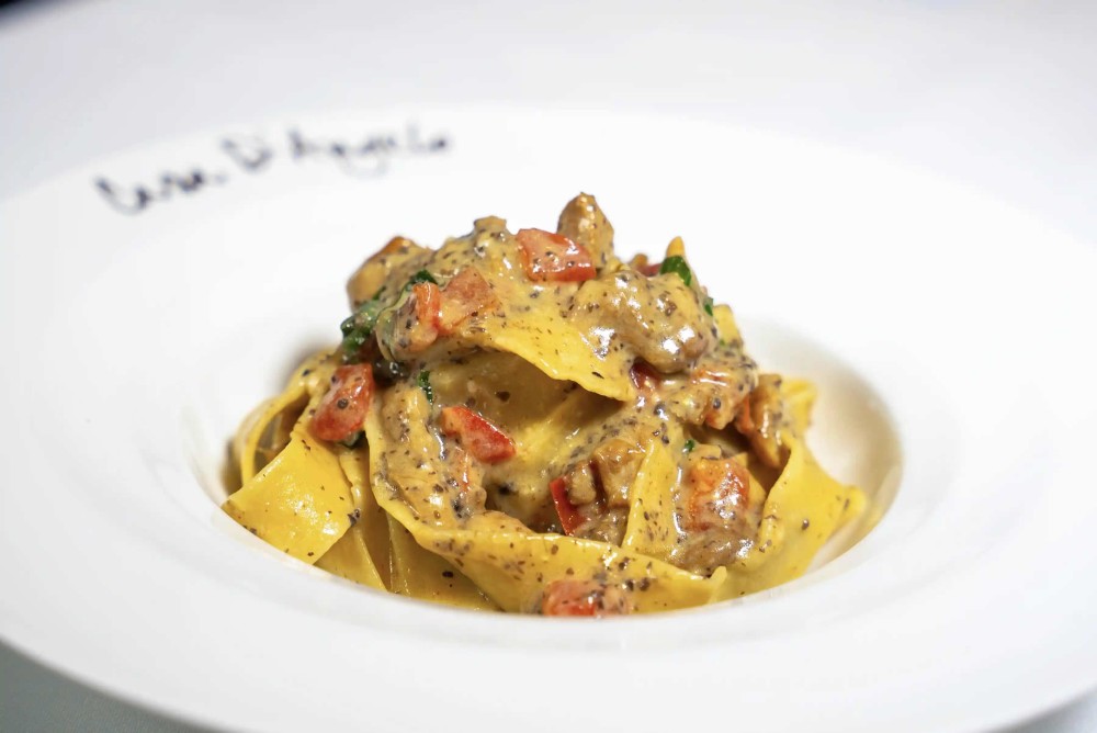 Home-Made Pappardelle, Porcini Mushrooms, Tomato & Truffle Cream Sauce, Basil, Grated Reggiano