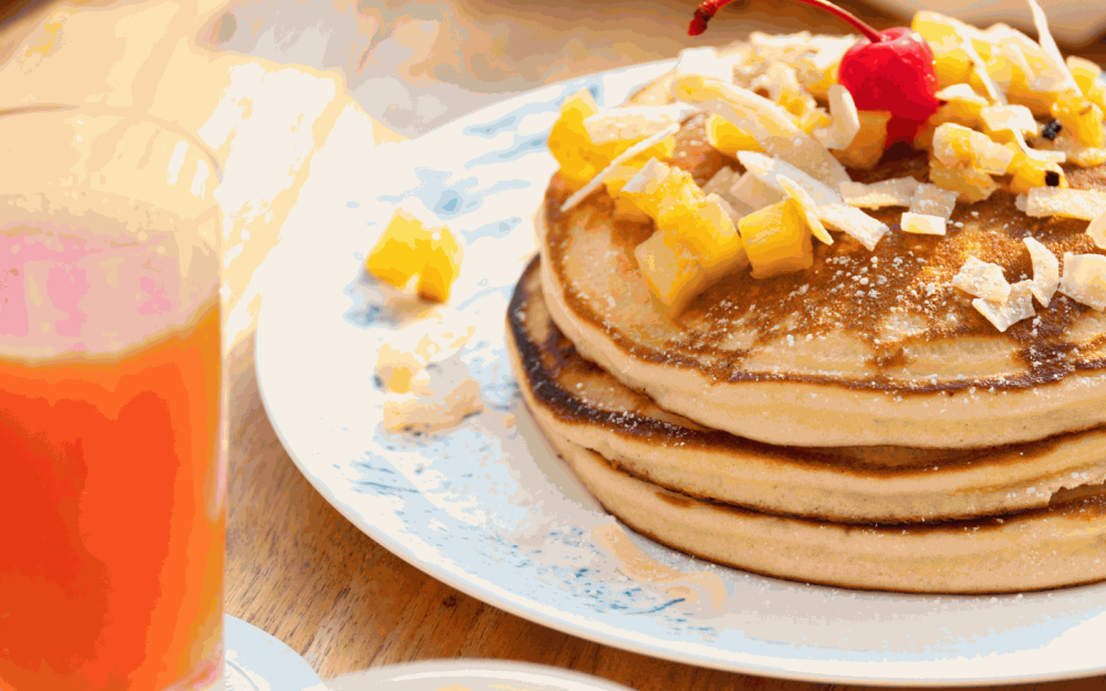 Indulge in the ever-so-fluffy Pina Colada Pancakes
