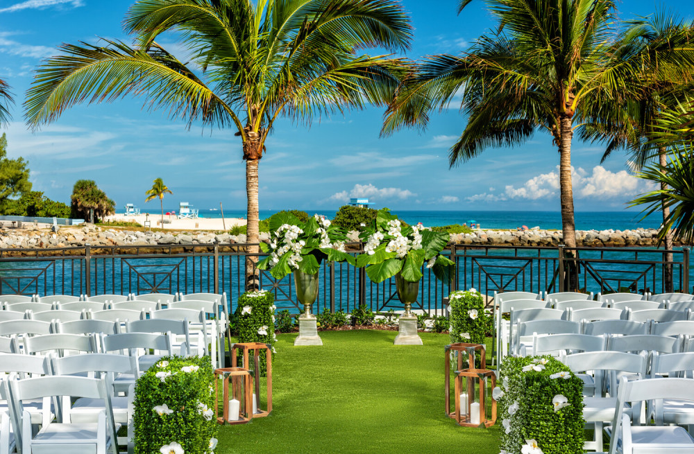 A wedding ceremony on the Cabana Green affords spectacular ocean views.