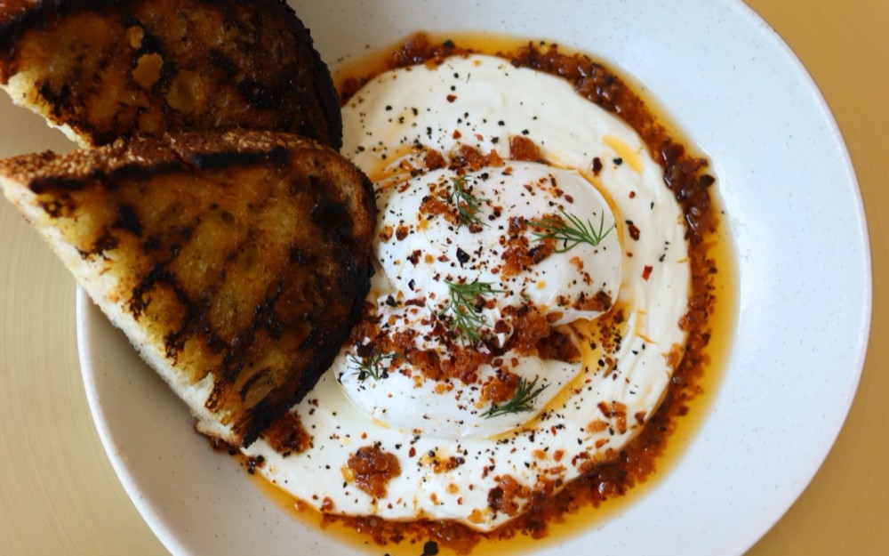 poached egg, garlic yogurt, Calabrian chili