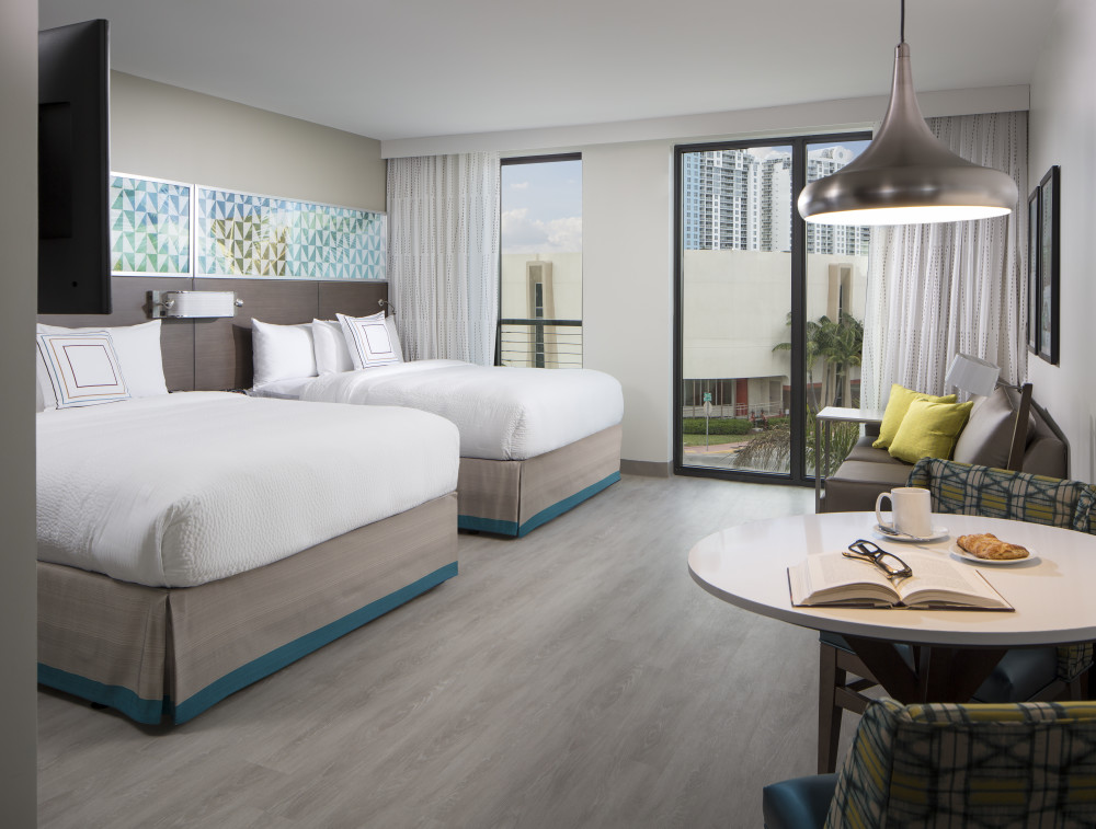 Our spacious Queen/Queen Studio Suites offer just the right amount of space to work and relax during your stay near South Beach.