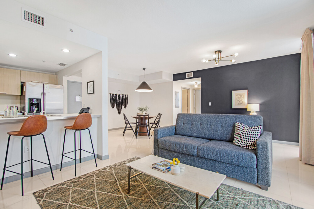 Stay in comfort and convenience at Habitat Brickell by Roami, steps away from Miami's financial center and Brickell area, with daily, weekly, and monthly rentals available and a range of amenities to make your visit unforgettable.