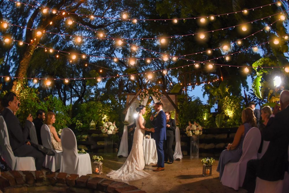 Our outside patio ceremony with bistro lighting is truly unique.