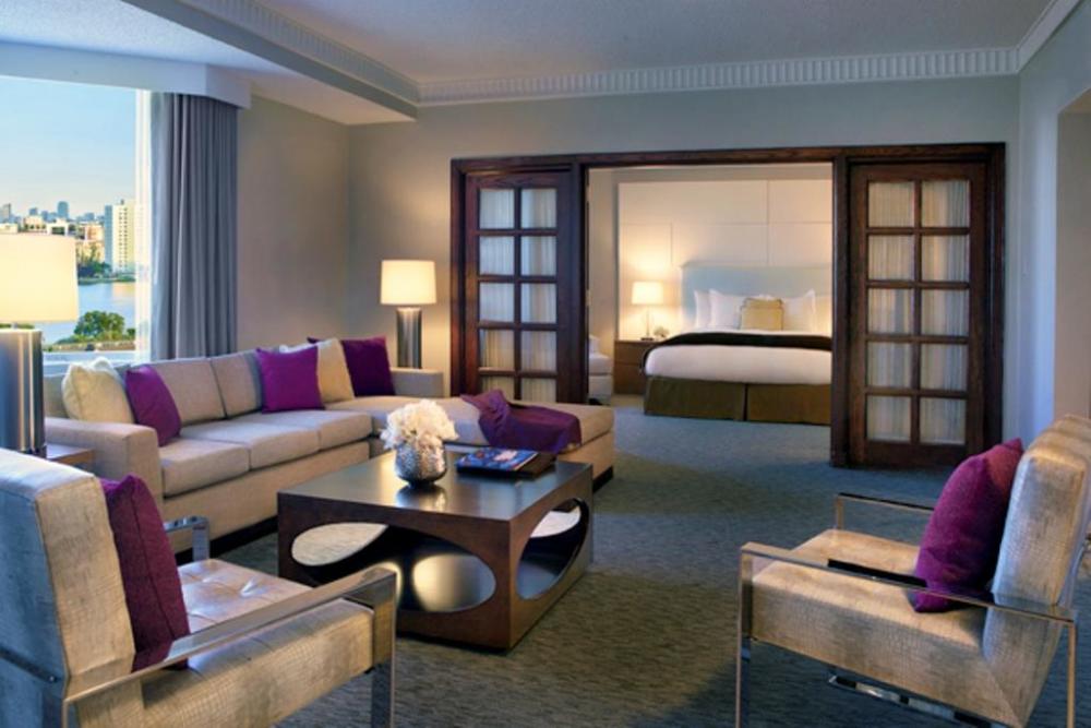 Superior Suites with one king bed feature a separate private dining area, Nespresso coffee maker, TV in the bedroom and living area. Free WIFI, Keurig coffee, refrigerator, working area and bedding with duvet.