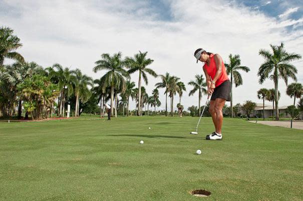 The putting green practice area at Country Club of Miami