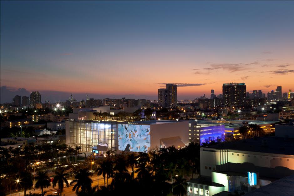 SW Aerial Night View of Facade Photo by Claudia Uribe