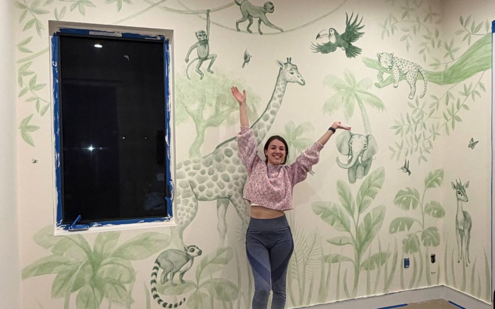 Painting custom handmade mural for nursery Patricia Machin, Muse&Flow Founder and Creative guide
