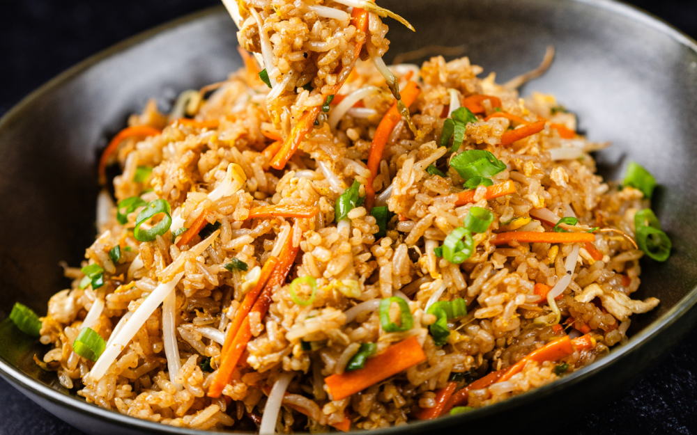 Savory Chinese Fried Rice with vegetables and protein of your election, vegetarian option with shiitake mushrooms as substitution.