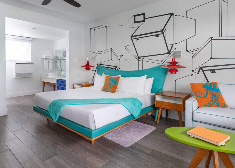 Larger King room with a seating area, small fridge and Keurig coffee machine