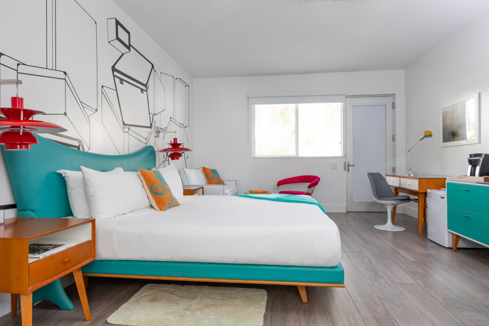 Larger King room with a seating area, small fridge and Keurig coffee machine