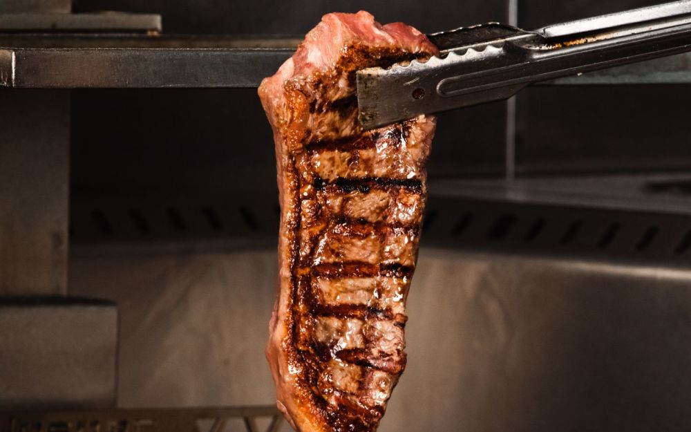 A 12 oz prime cut, expertly grilled to your preferred temperature. This classic steak boasts bold, beefy flavor with a perfect balance of tenderness a