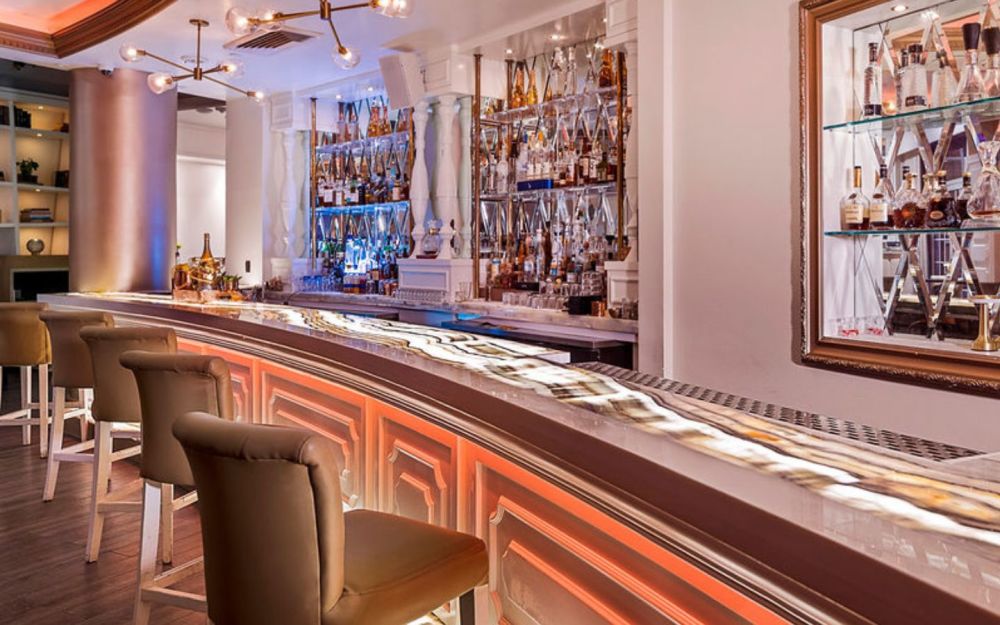 Long bar with its sleek design and inviting ambiance.