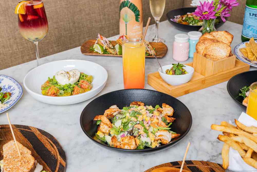 From burrata salad to tacos and sangria—Orange Blossom brings bold, fresh flavors and colorful sips to every table, all day long.