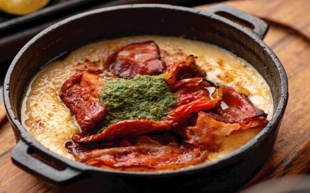 Provoletta with prosciutto, sun dried tomato, pesto