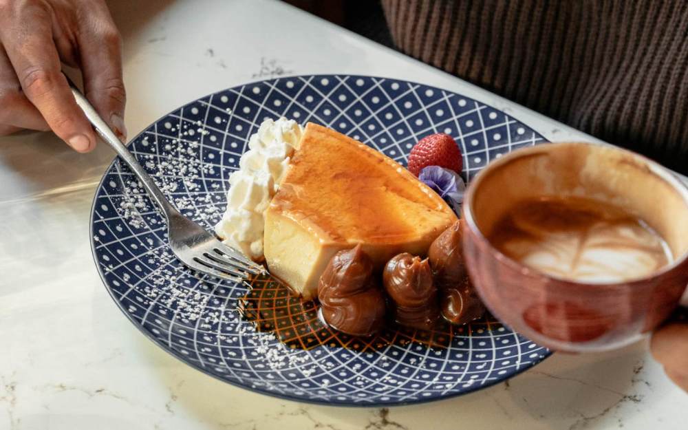 Special Homemade Flan served with whipped cream & dulce de leche