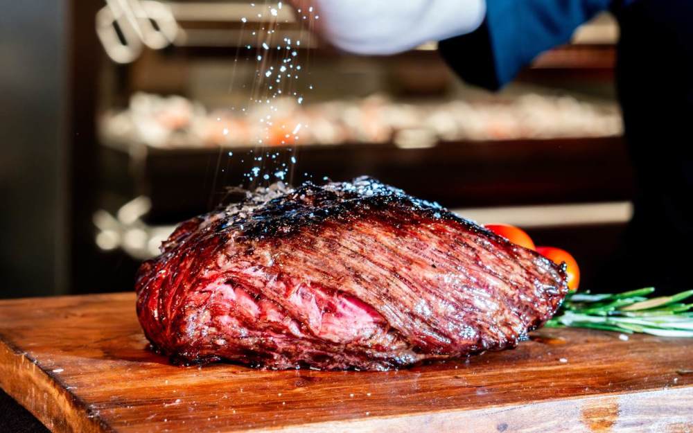 Flap steak is thicker and more marbled, which means more tenderness and flavor, simply served with chimichurri