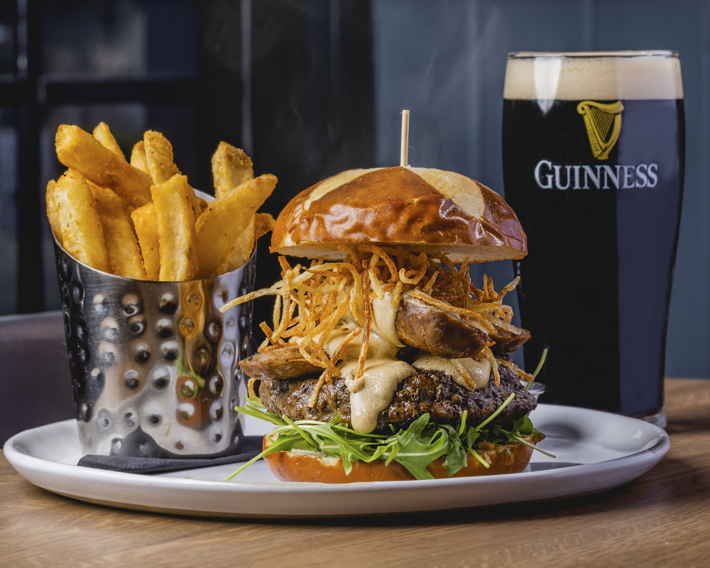 8oz dry-aged beef, arugula, beer brat sausage, Guinness beer brie fondue, truffled crispy potatoes, pretzel bun, served with french fries