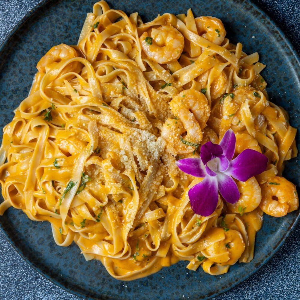 Fettuccine with Shrimp is a perfect fusion of Italian comfort and Peruvian flair. Tender shrimp tossed in a luscious sauce over perfectly cooked pasta