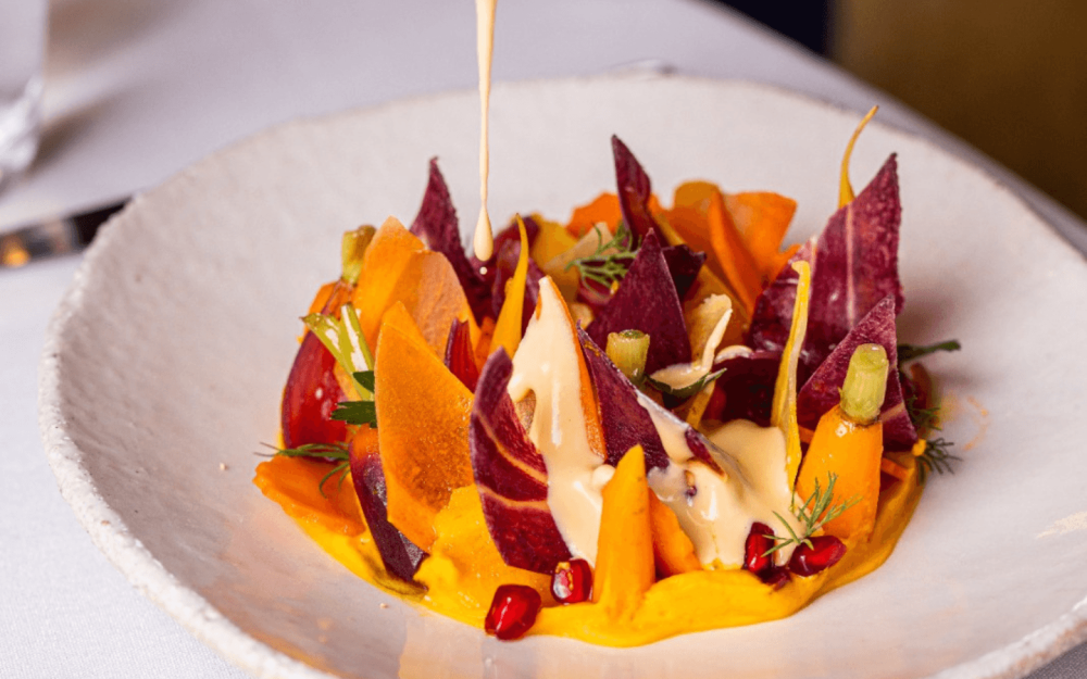 Braised coloured carrots with watercress sauce