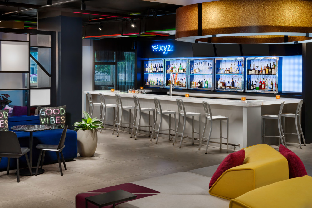Unwind at the WXYZ, modern space, perfect for both relaxation and socializing.