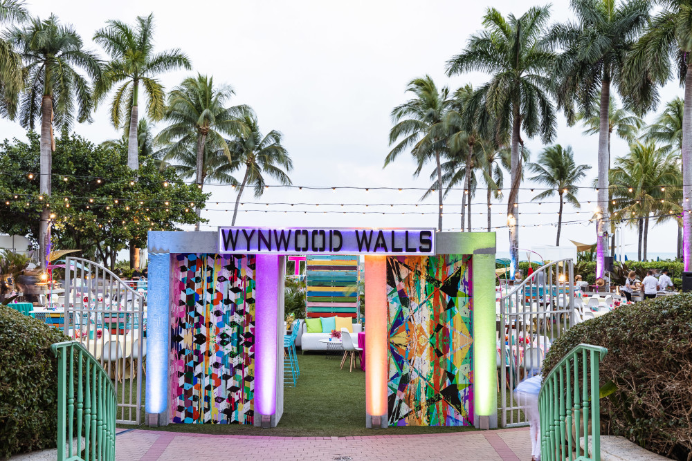 DCi's design team makes a big statement with illuminated focal decor during an event inspired by Wynwood Walls.