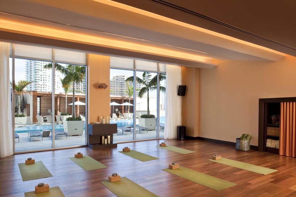 15 treatment rooms, from massage to biomed, a serene yoga room, Fitness studio with Peleton bikes, Stairmasters, free weights and a class studio