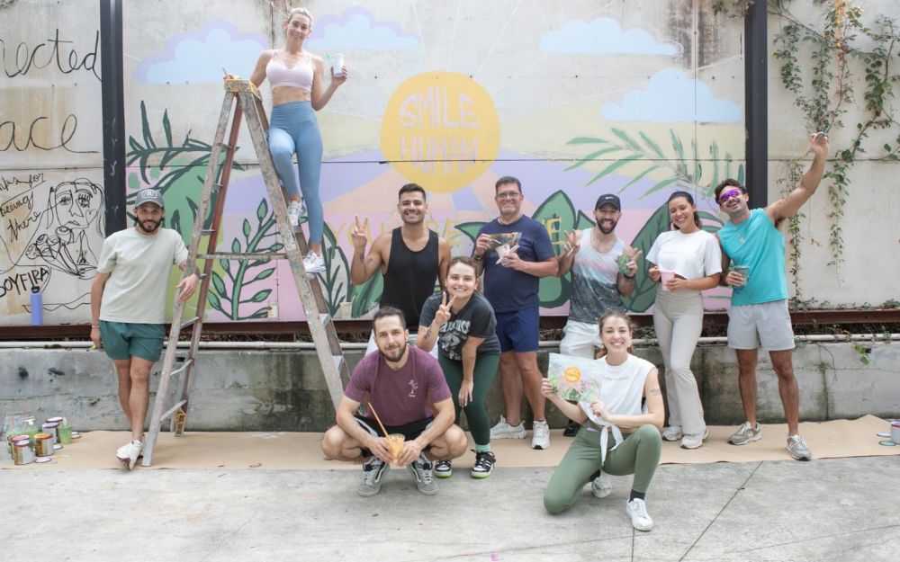 Smile Human group mural with Leom Wellbeing at Miami Ironside