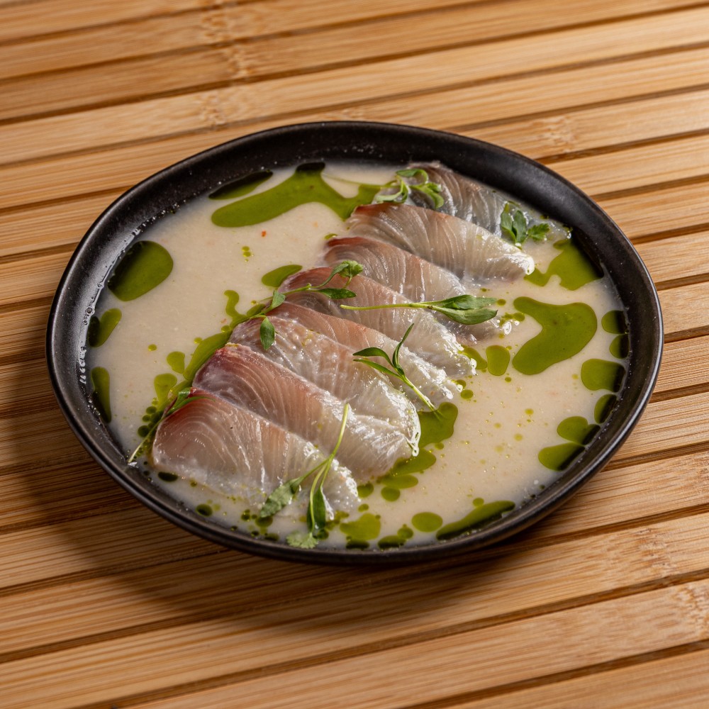 Aji limo, Leche de tigre, serrano, watermelon radish.