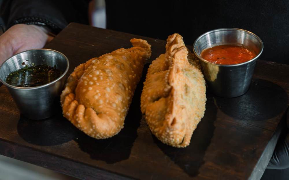Golden, hand-folded pastry pockets filled with your choice of savory ingredients, seasoned meats, spinach or cheese & onion