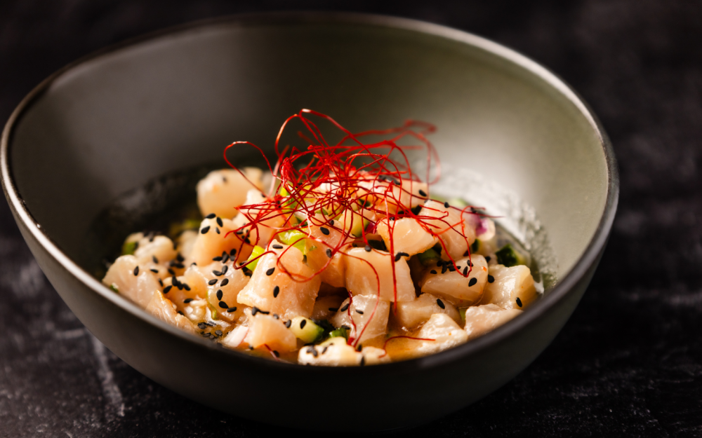 Refreshing Citrus Mahi Ceviche with zesty Yuzu, crisp jalapeño, and fragrant toasted sesame oil.