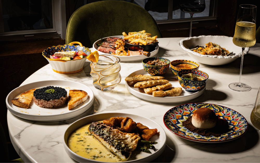 Three-course dinner featuring fresh seafood, prime steak, vibrant starters, and house-made desserts.