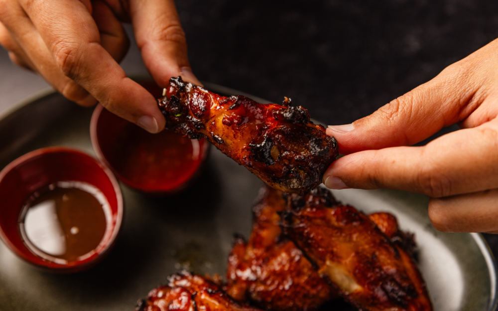 Crispy Chicken wings tossed in a spicy Szechuan sauce with a kick and hint of sweetness.