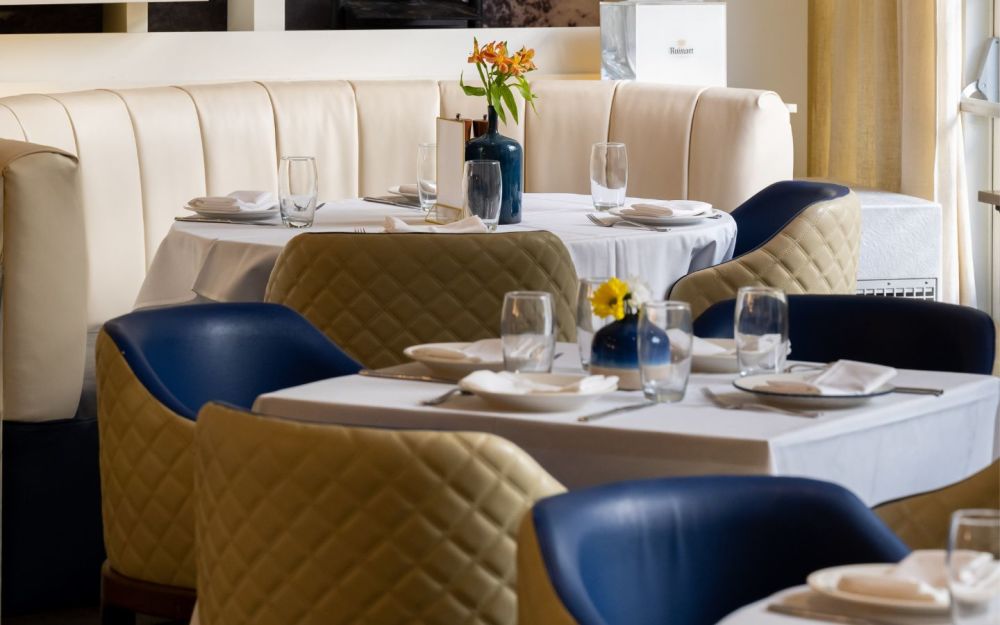 The refined setting serves as an exceptional canvas, exuding decadent charm and sophistication, making it unnecessary for additional enhancements.