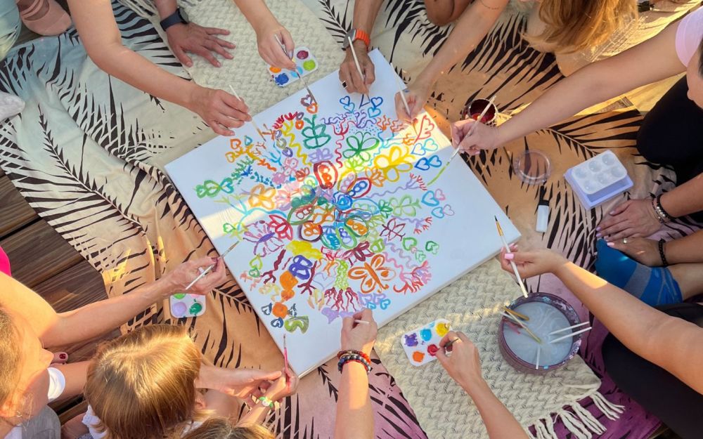 Group mandala painting with Michelle Badillo Kundalini Yoga students. 2024