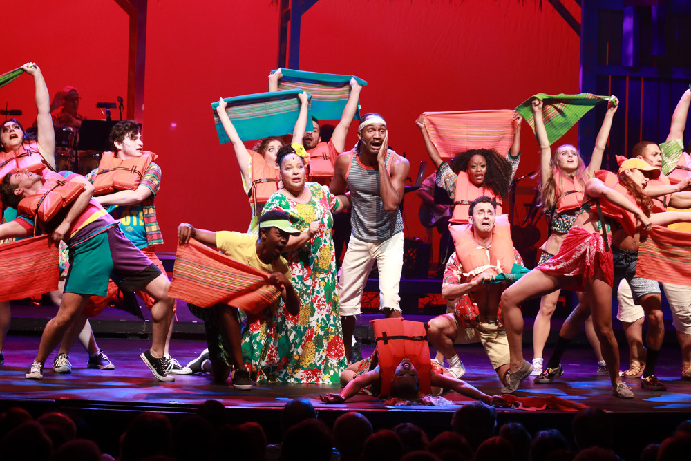 The cast of Jimmy Buffett's Escape to Margaritaville at Actors’ Playhouse at the Miracle Theatre. Photo by Alberto Romeu.