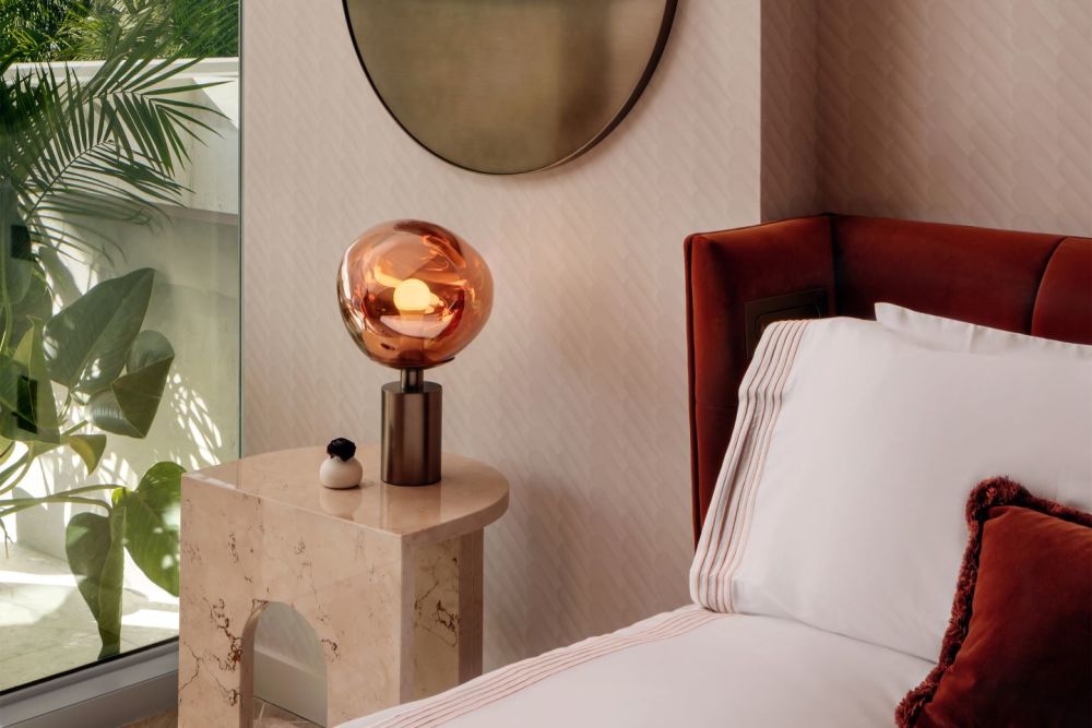 Guest room bedside with balcony