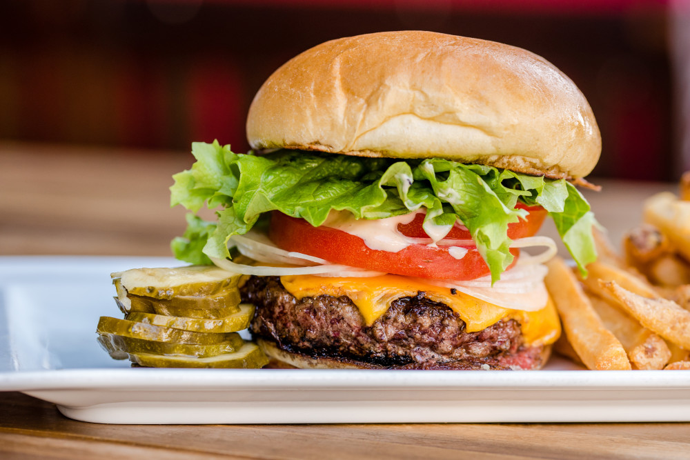 1/2lb. AmSo beef blend patty, American, AmSo sauce, LTO, brioche