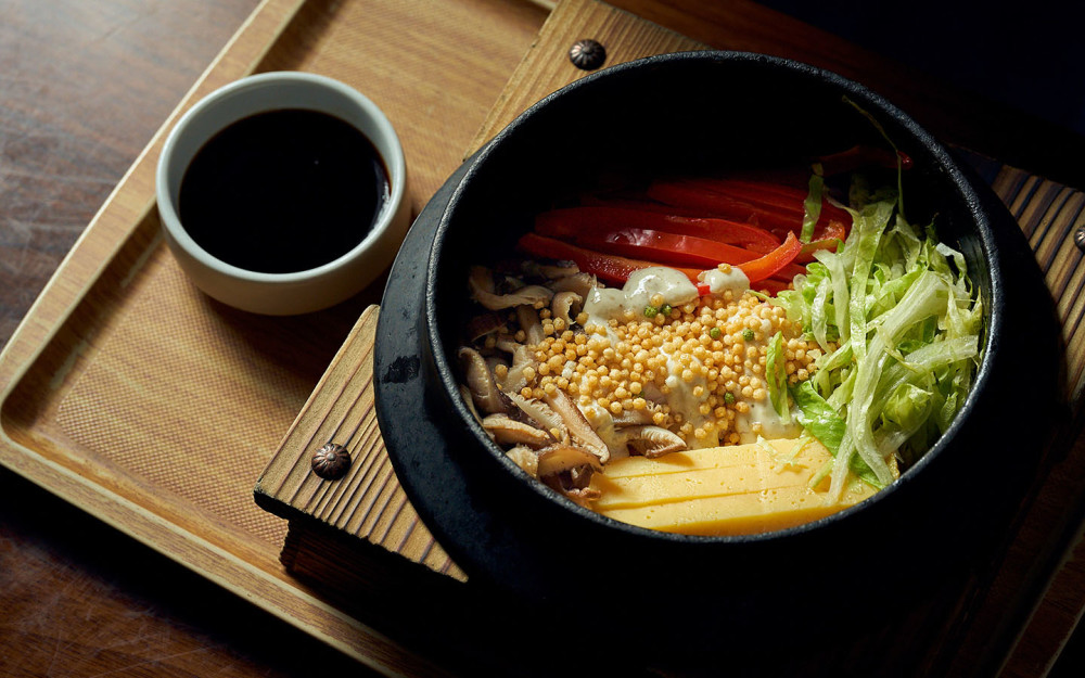A beloved staple reimagined with elegance, the Crab Fried Rice at Azabu Miami Beach blends comforting flavors with refined technique.