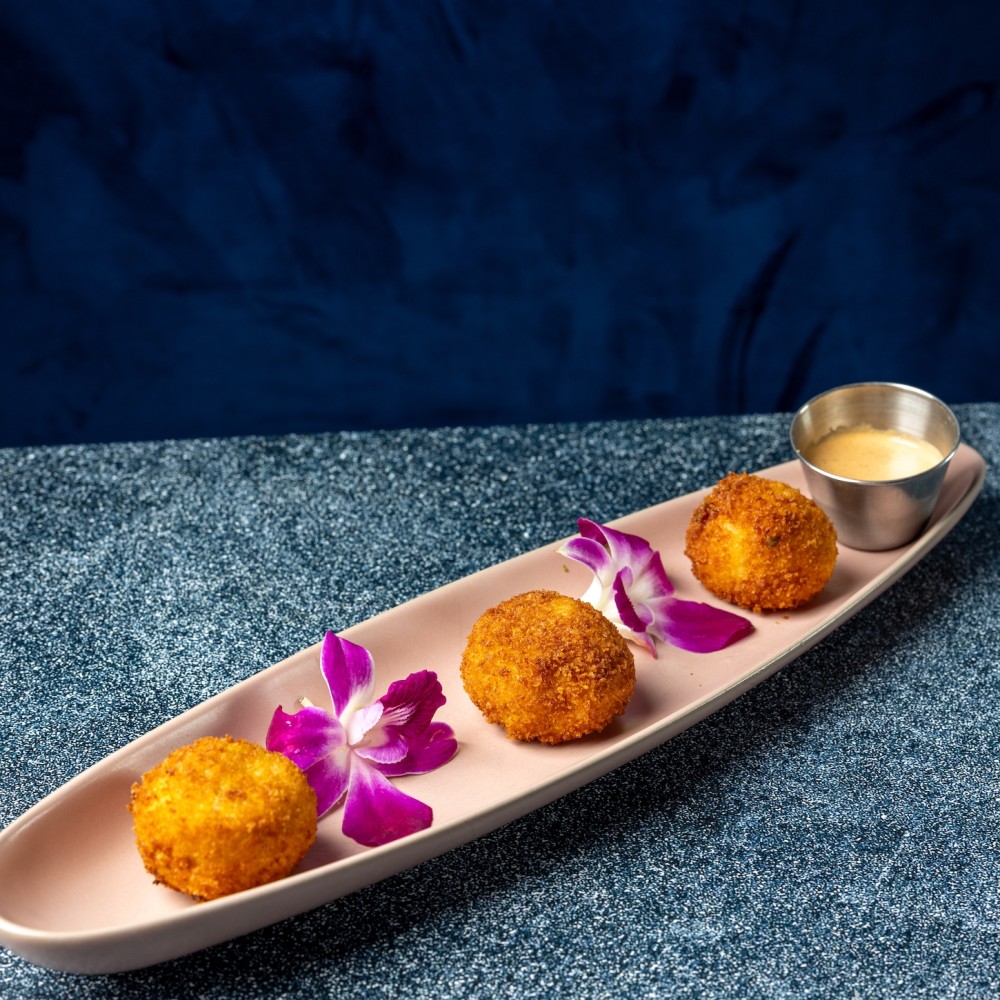 Crispy on the outside, creamy and comforting on the inside — our Ají de Gallina Croquettes are a bite-sized take on the Peruvian classic you know and