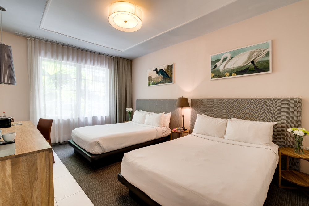 Our spacious Standard Double Rooms are appointed with beachy-chic artwork, soothing color palettes and refined wood furnishings. Plush beds with crisp, high-thread count linens and deluxe coverlets add a rich layer of texture to the living experience.