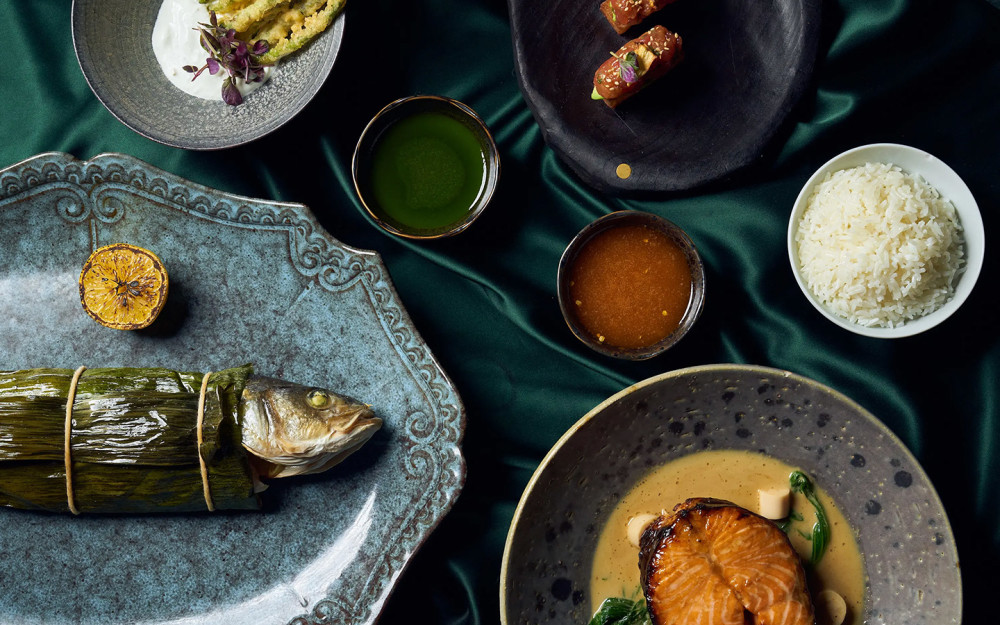Whole roasted branzino, Green curry sauce, lemon rice, Faroe island salmon