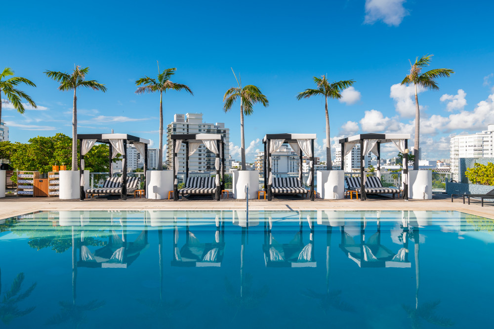Our lavish rooftop oasis is unlike any other. Lounge around in one of our exclusive pool cabanas with ocean and city views, play lawn games or indulge in a drink or two.