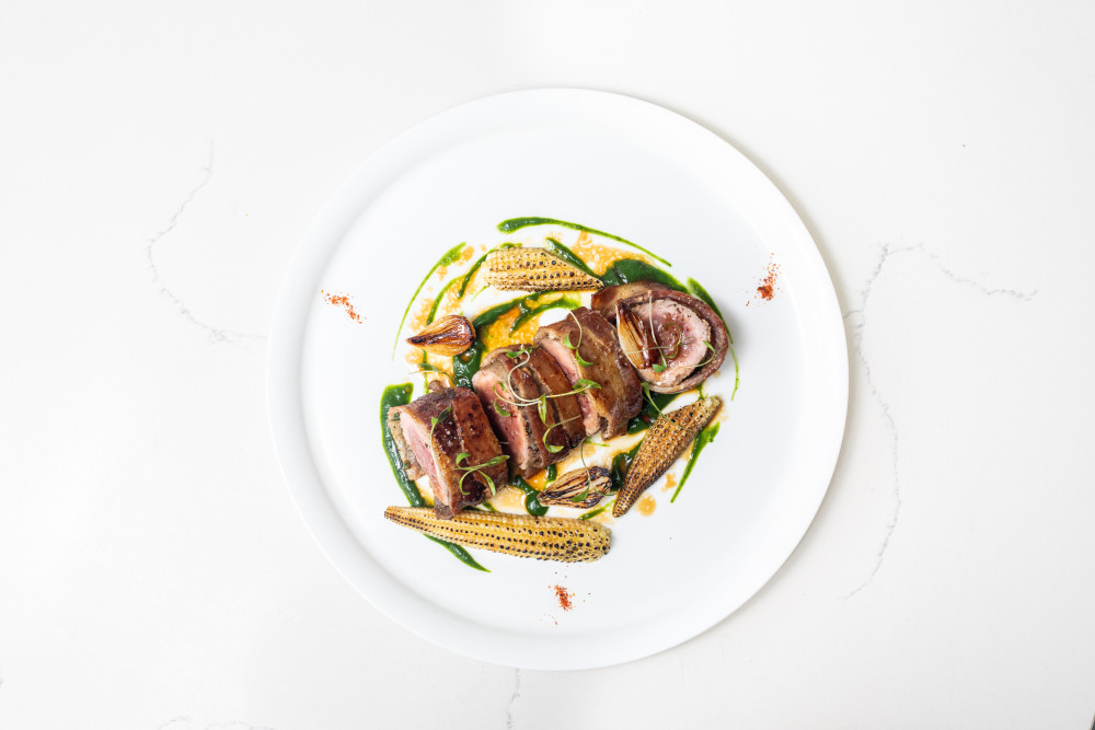 Bacon wrapped heritage pork loin, scallion, ginger, natural jus