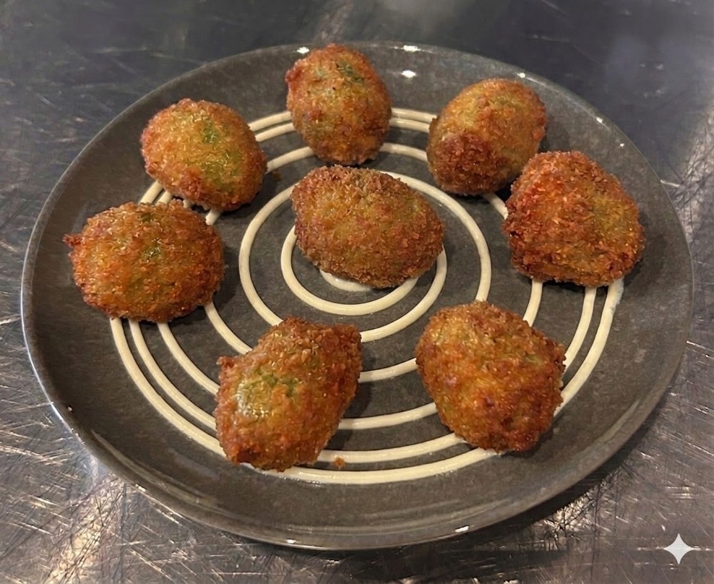 Our signature Breaded Olives, Stuffed with Chorizo and Fried